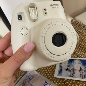 POLAROID white camera with film
